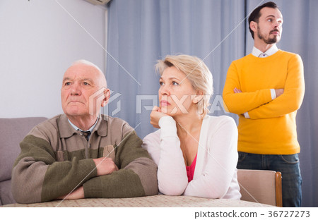 Parents arguing with son 36727273