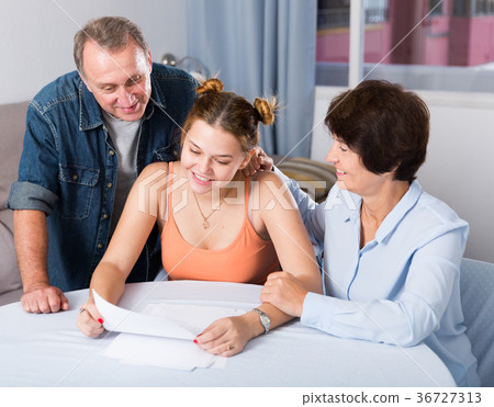 Female is singing contract with her parents Female is singing contract with her parents 36727313