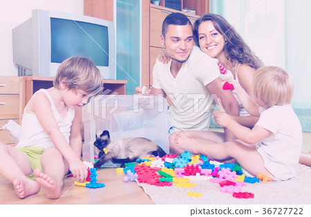 Happy family playing in home interior 36727722