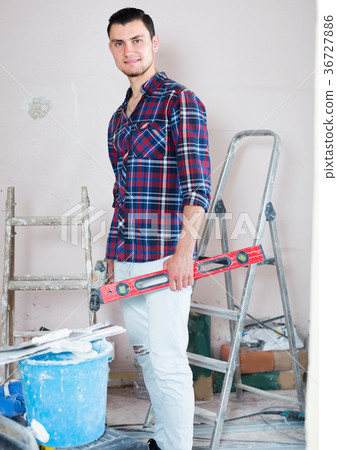 Portrait of smiling man which is ready for renovation. 36727886