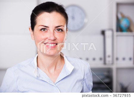 Portrait of young smiling woman in shirt Portrait of young smiling woman in shirt 36727935