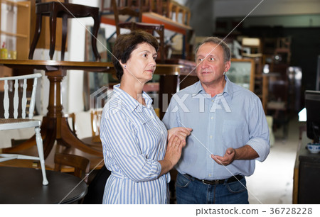 Portrait of glad couple who is shopping Portrait of glad couple who is shopping 36728228