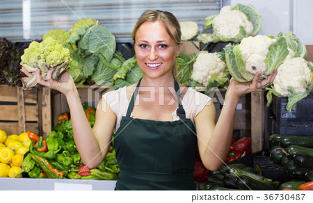 woman selling fresh cabbage 36730487
