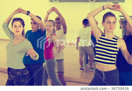 Pair of teenagers studying of partner dance 36730616