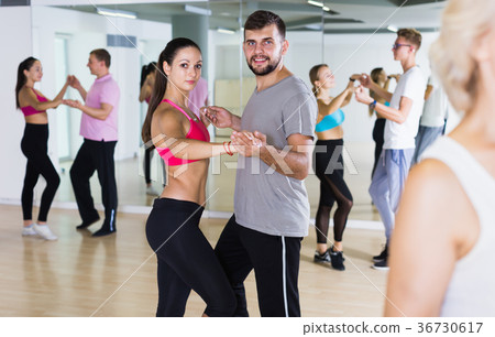 Positive dancing pair dance together Positive dancing pair dance together 36730617