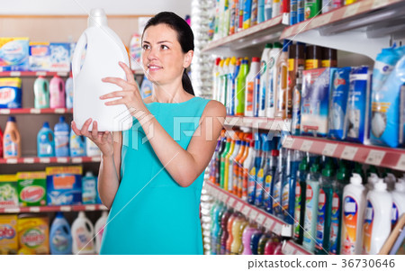 Pretty female want to buying softener in bottle Pretty female want to buying softener in bottle 36730646