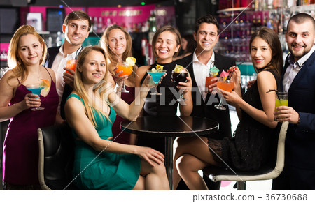 Females and males celebrating corporate Females and males celebrating corporate 36730688