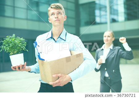 Boss woman is wishing good luck to office worker 36730721