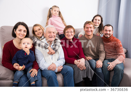 Friendly large family making numerous photos 36730836