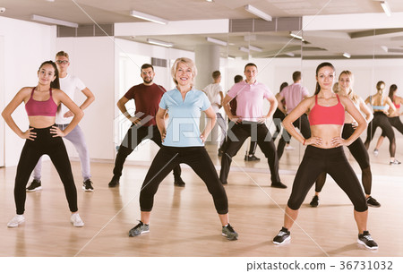 Group of happy people practice sport dance 36731032