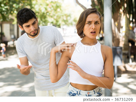 portrait of male and female talking emotional at the street portrait of male and female talking emotional at the street 36731209