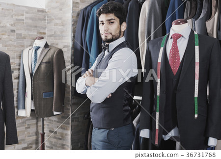 Man is demonstrating image in waistcoat with butterfly 36731768