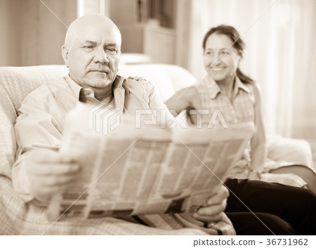 Portrait of laughing mature woman and elderly man Portrait of laughing mature woman and elderly man 36731962