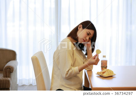 Maternity woman holding sweets 36734297