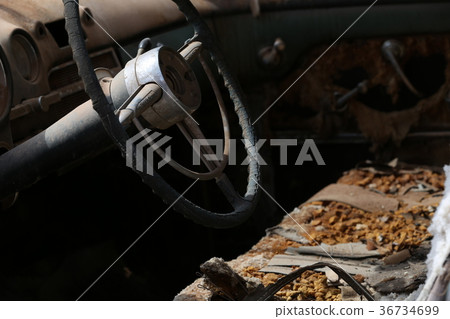 Interior of the old abandoned car Interior of the old abandoned car 36734699