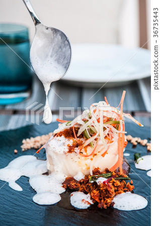 Grilled cod fish with  lemon foam sauce 36735443
