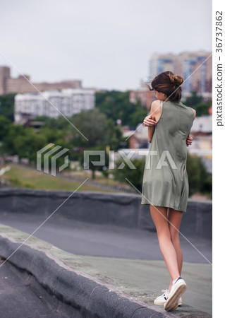 Roof walk pretty girl alone concept. Roof walk pretty girl alone concept. 36737862