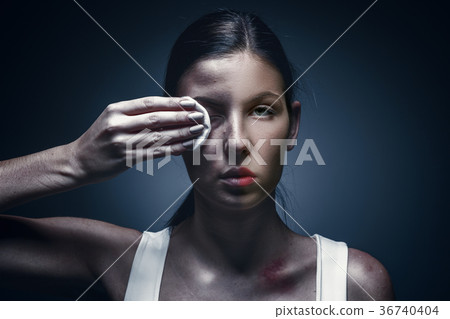 Close up portrait of a crying woman with bruised Close up portrait of a crying woman with bruised 36740404