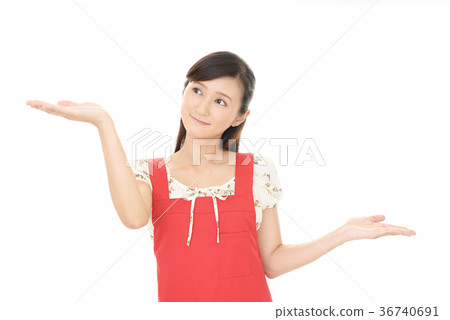 A woman in an apron A woman in an apron 36740691