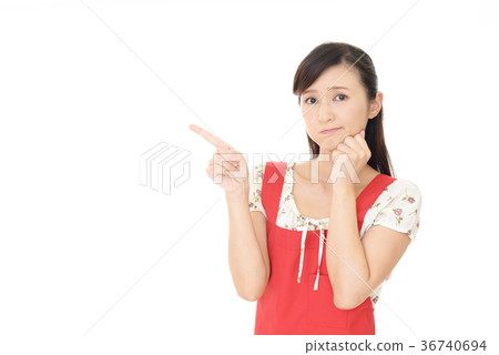 A woman with an unhappy expression A woman with an unhappy expression 36740694