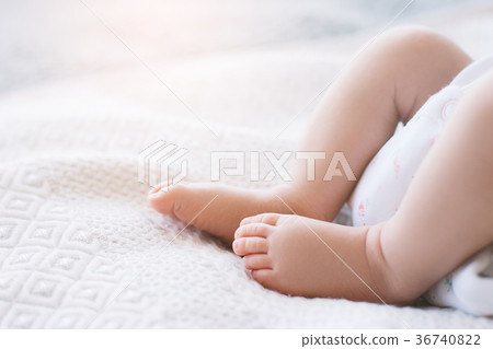 little newborn baby feet white background 36740822