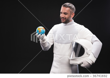 Optimistic skilled astronaut is expressing 36741692