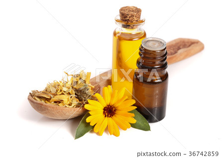 aromatherapy essential oil with marigold flowers aromatherapy essential oil with marigold flowers 36742859