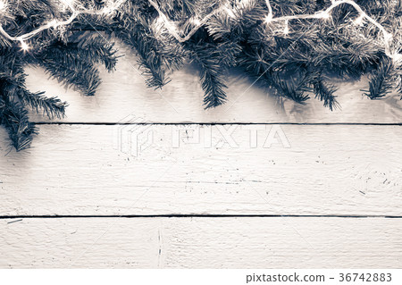 Wooden background with spruce branches for Wooden background with spruce branches for 36742883
