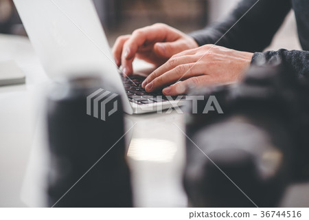 Man arms writing in laptop 36744516