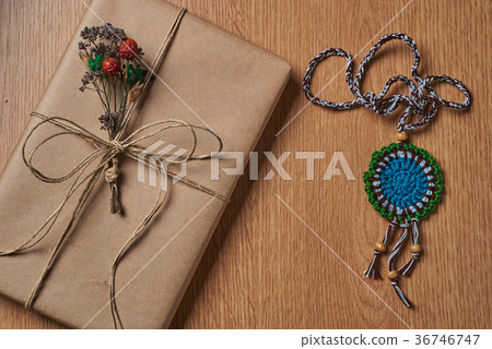 Wrapped book and medallion. Wrapped book and medallion. 36746747