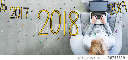 2018 with man using a laptop 2018 with man using a laptop 36747819