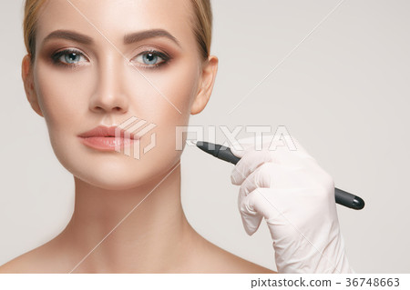 Beautiful young woman before plastic surgery 36748663