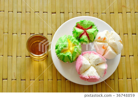 assorted colorful cotton wool cake in paper  36748859