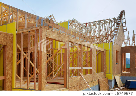 Installation of wooden beams at construction Installation of wooden beams at construction 36749677