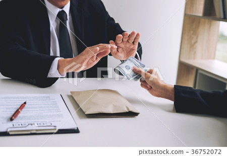 Bribery and corruption concept, senior businessman manager refus Bribery and corruption concept, senior businessman manager refus 36752072