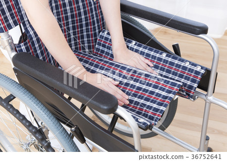Caregiver preparing a wheelchair Body parts Parts cut Faceless Caregiver preparing a wheelchair Body parts Parts cut Faceless 36752641