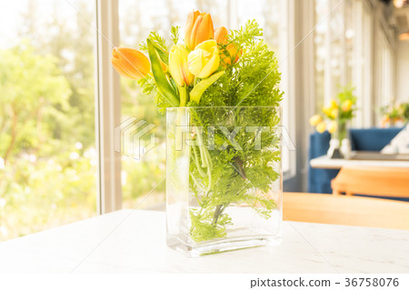 Plastic or fake flower in vase Plastic or fake flower in vase 36758076