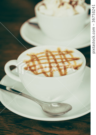 Hot caramel coffee cup latte Hot caramel coffee cup latte 36758241