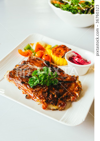 Grilled pork ribs with bbq sauce Grilled pork ribs with bbq sauce 36760323