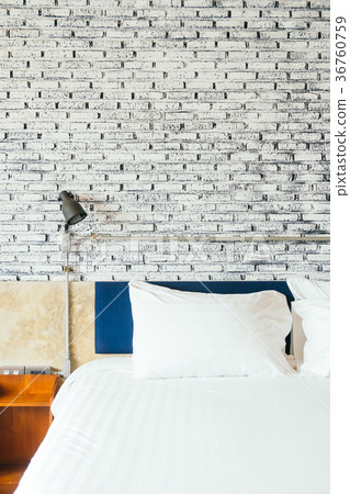 White pillow on bed 36760759