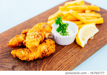 Fish and chip with french fries Fish and chip with french fries 36760777