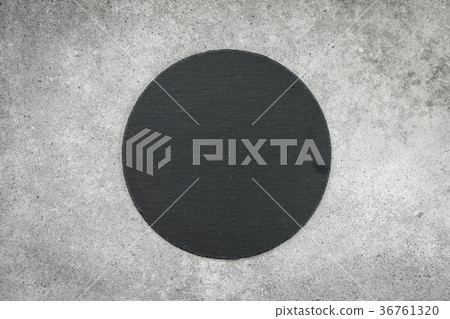 Slate on black stone background Slate on black stone background 36761320