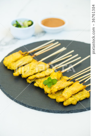 Chicken satay 36761384