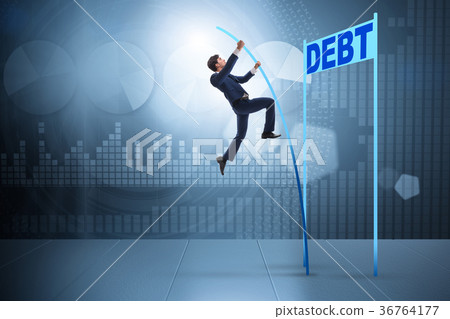 Businessman pole vaulting over debt in business 36764177