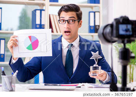 Businessman recording a video for vlog 36765197