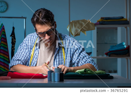 Male tailor working in sewer shop 36765291