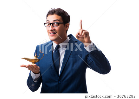 Businessman with magic lamp isolated on white 36765292