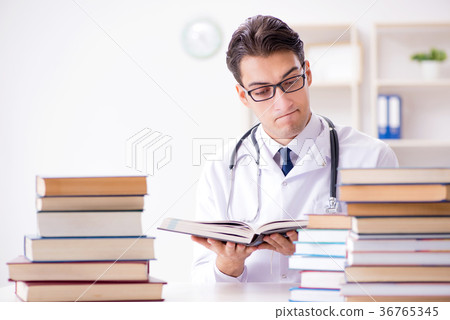 Medical student preparing for university exams 36765345