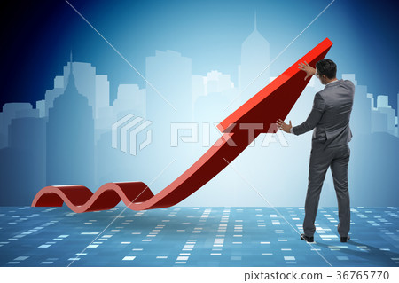 Businessman supporting growtn in economy on chart 36765770