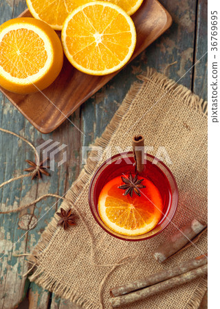 Christmas mulled wine on a rustic wooden table. Christmas mulled wine on a rustic wooden table. 36769695